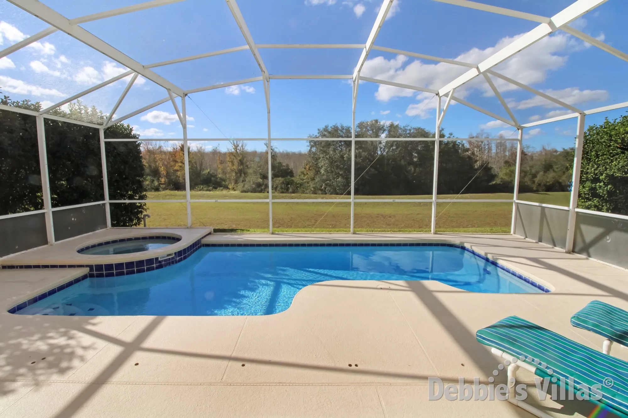 Complete privacy around the west-facing pool at this Highlands Reserve in Davenport
