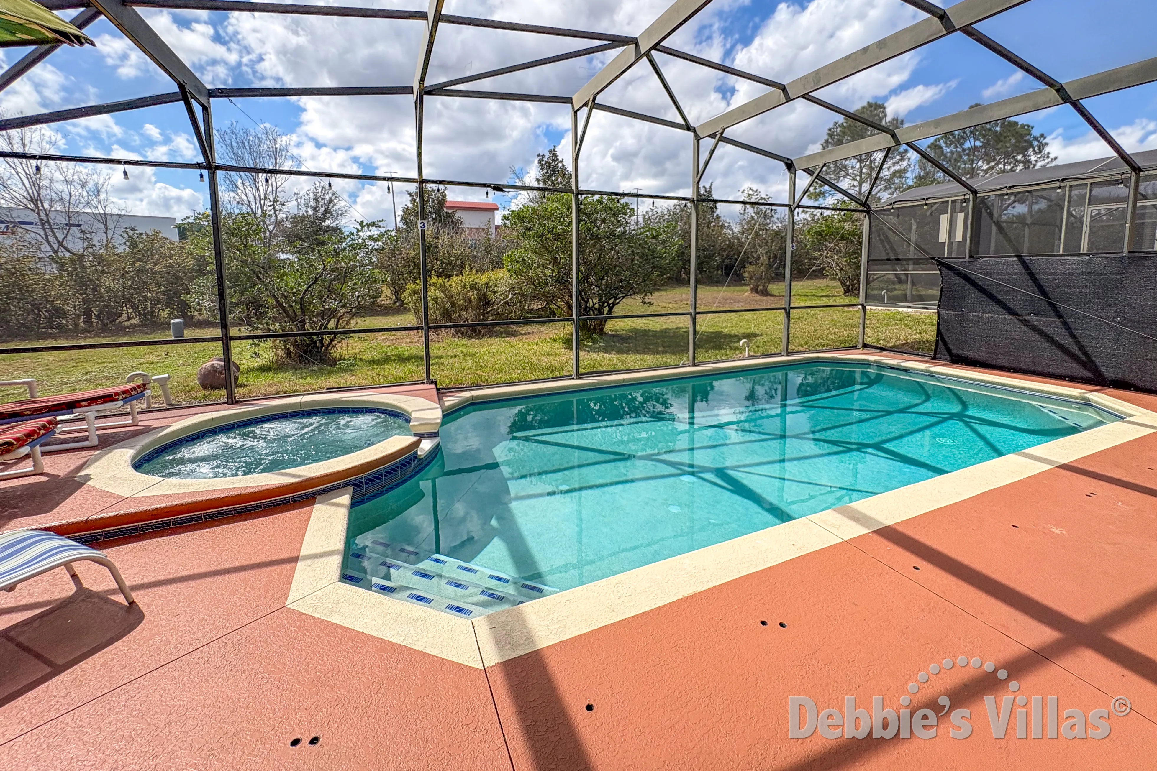 West-facing pool and spa at this vacation villa on Glenbrook in Clermont