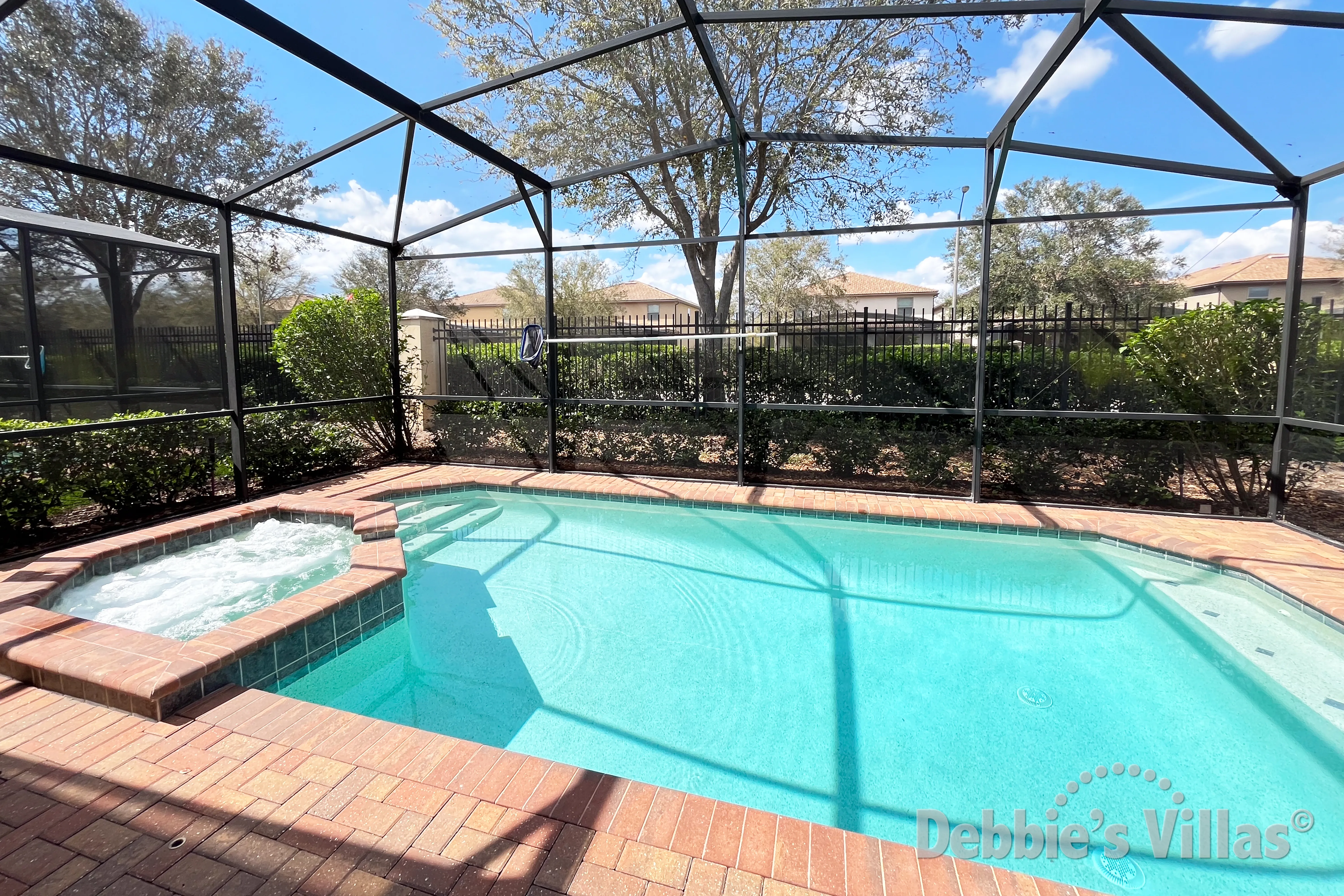 Northwest-facing pool and spa at this vacation villa on Windsor at Westside in Kissimmee