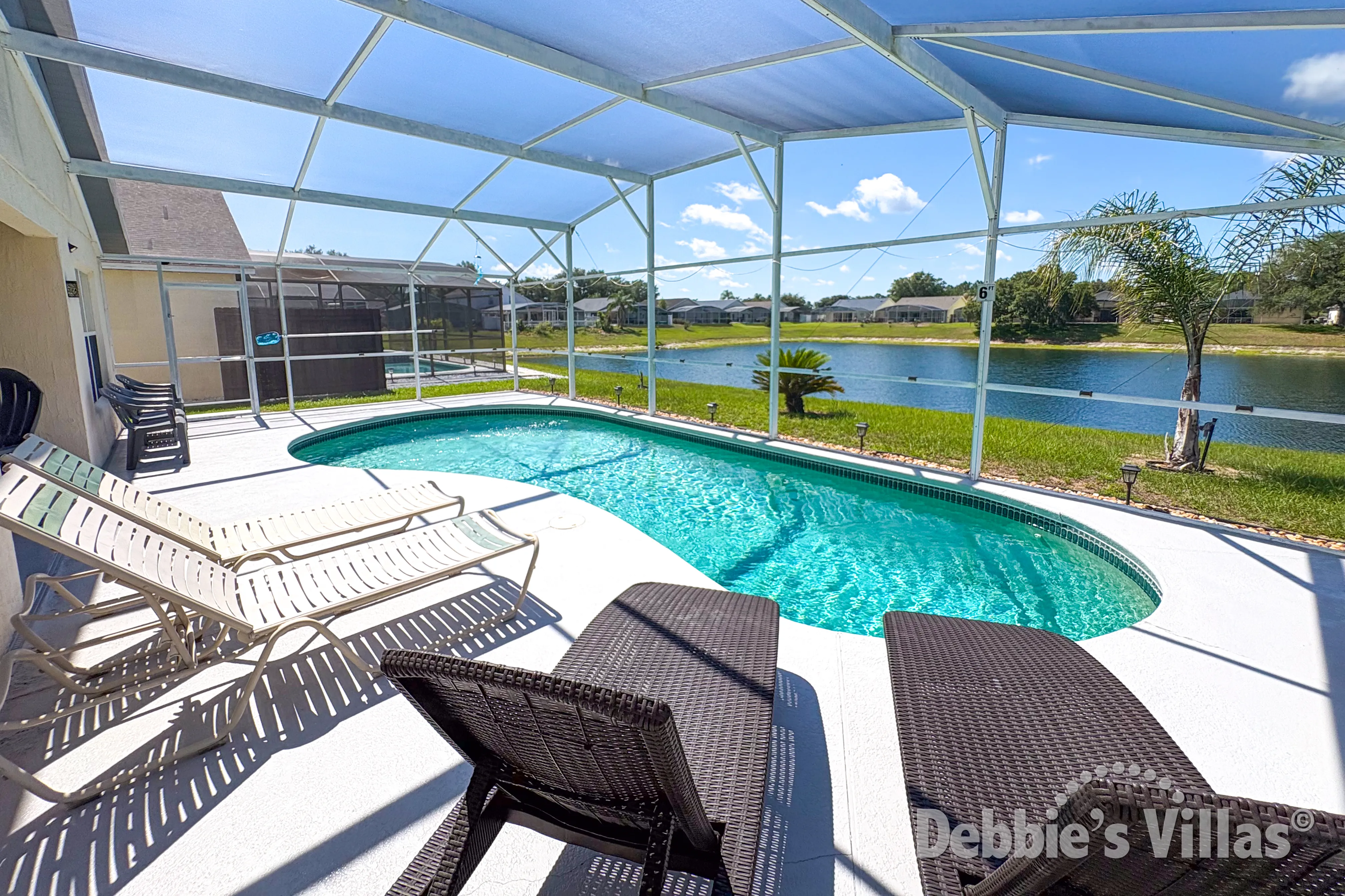South-facing private pool at this vacation villa on Clear Creek in Clermont 