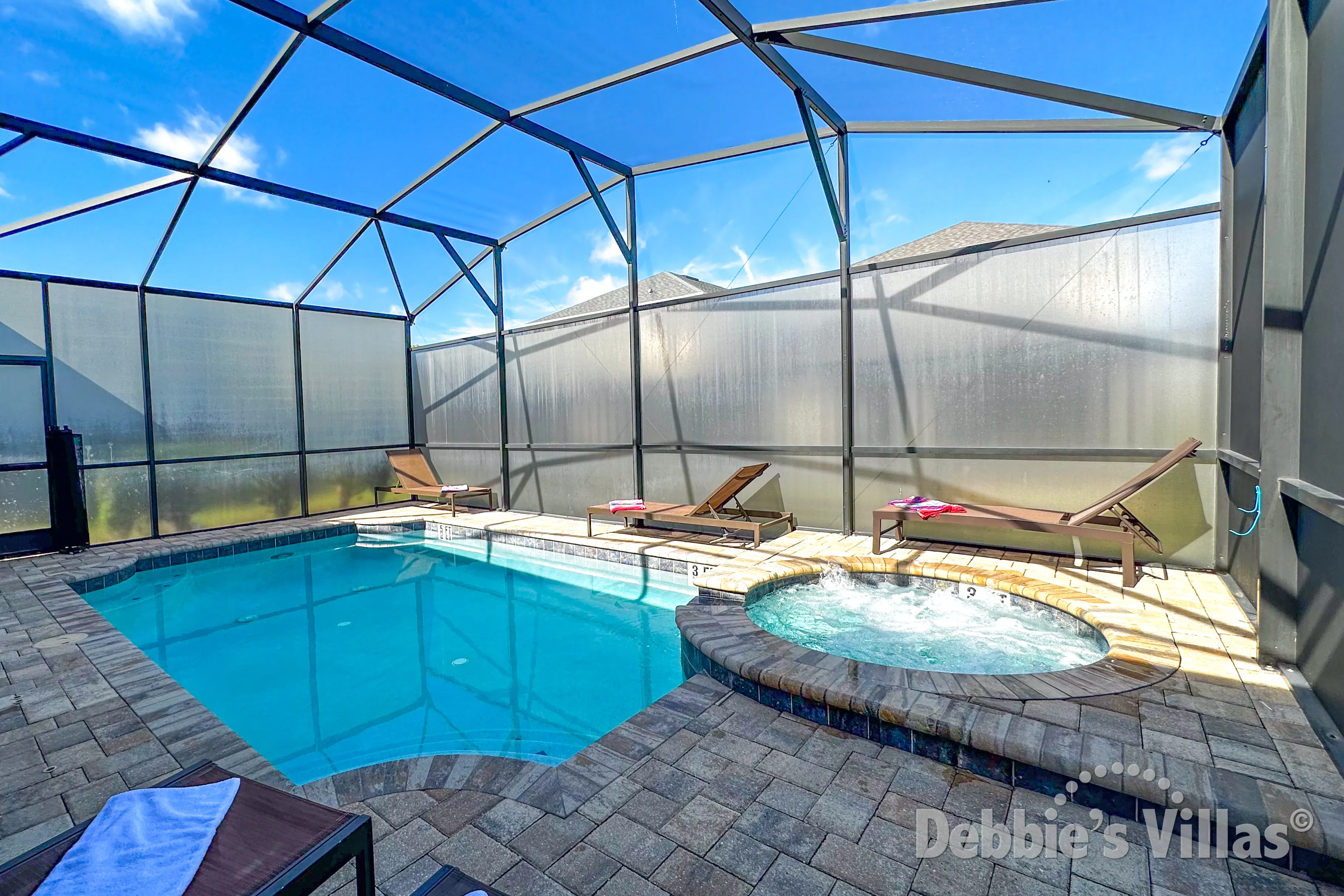 Sunny private pool and spa deck at this Solara vacation villa