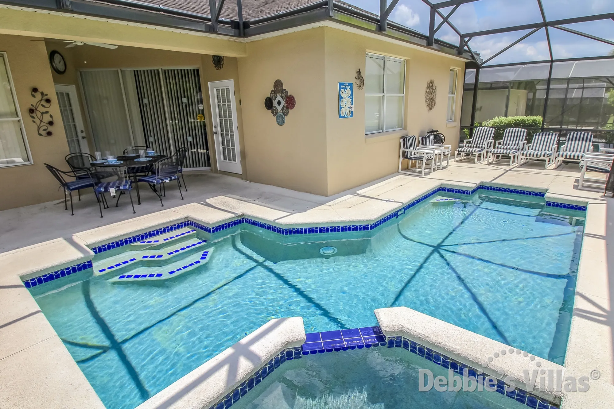 Sun-drenched Calabay Parc pool with easy access steps