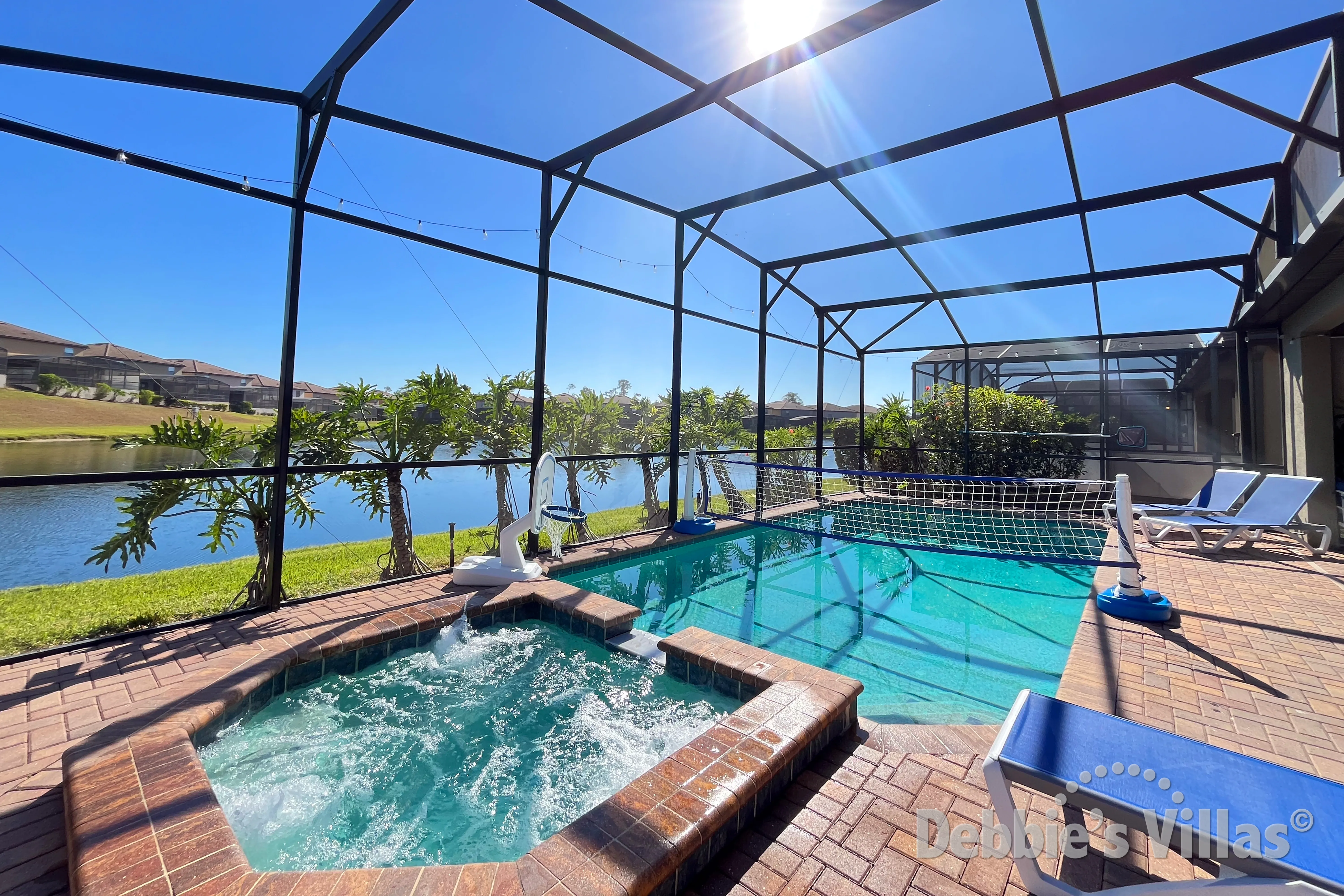 Southeast-facing pool and spa at this vacation villa on Windsor at Westside in Kissimmee