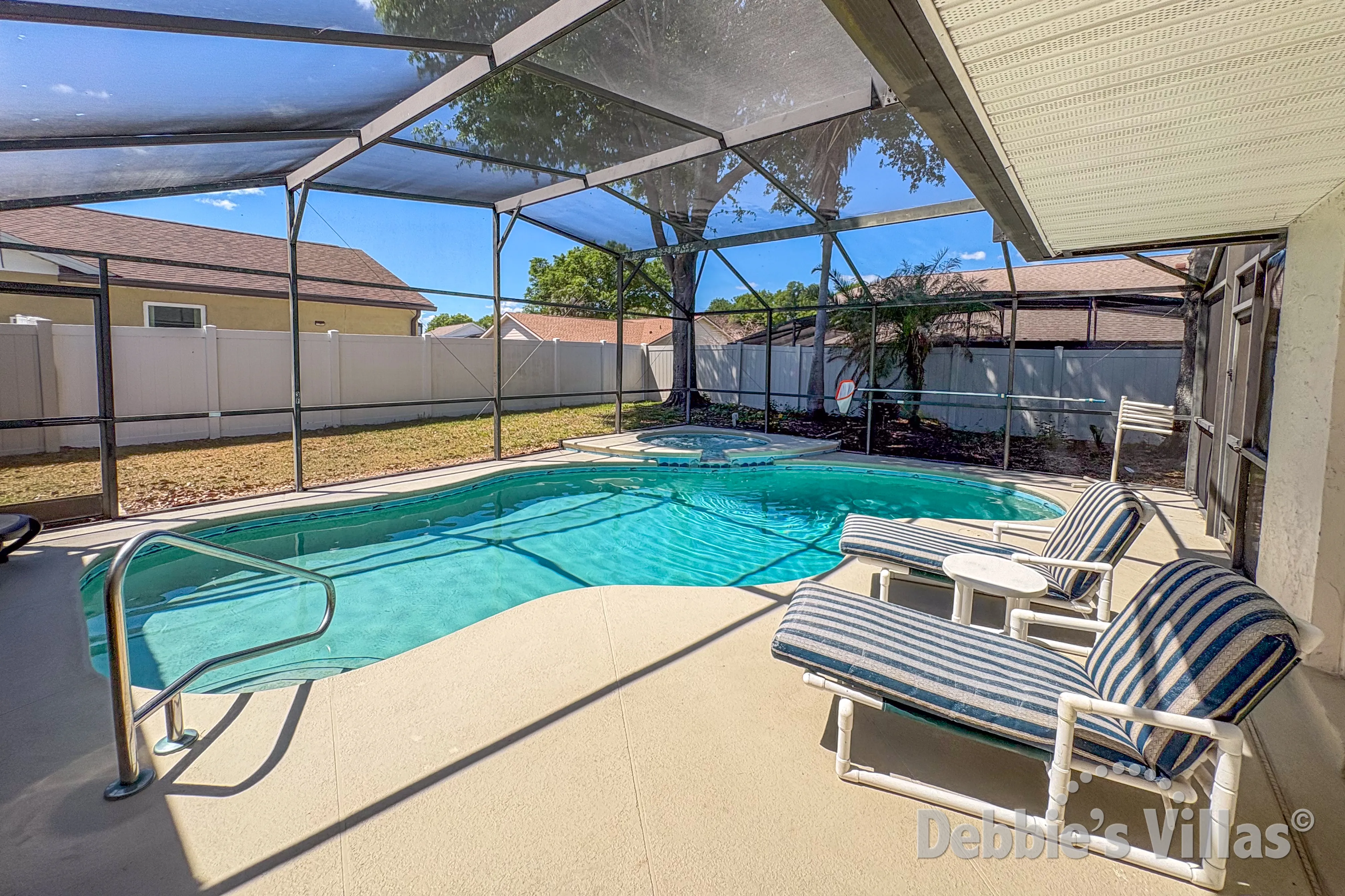 West-facing pool and spa at this vacation villa on Greater Groves in Clermont 