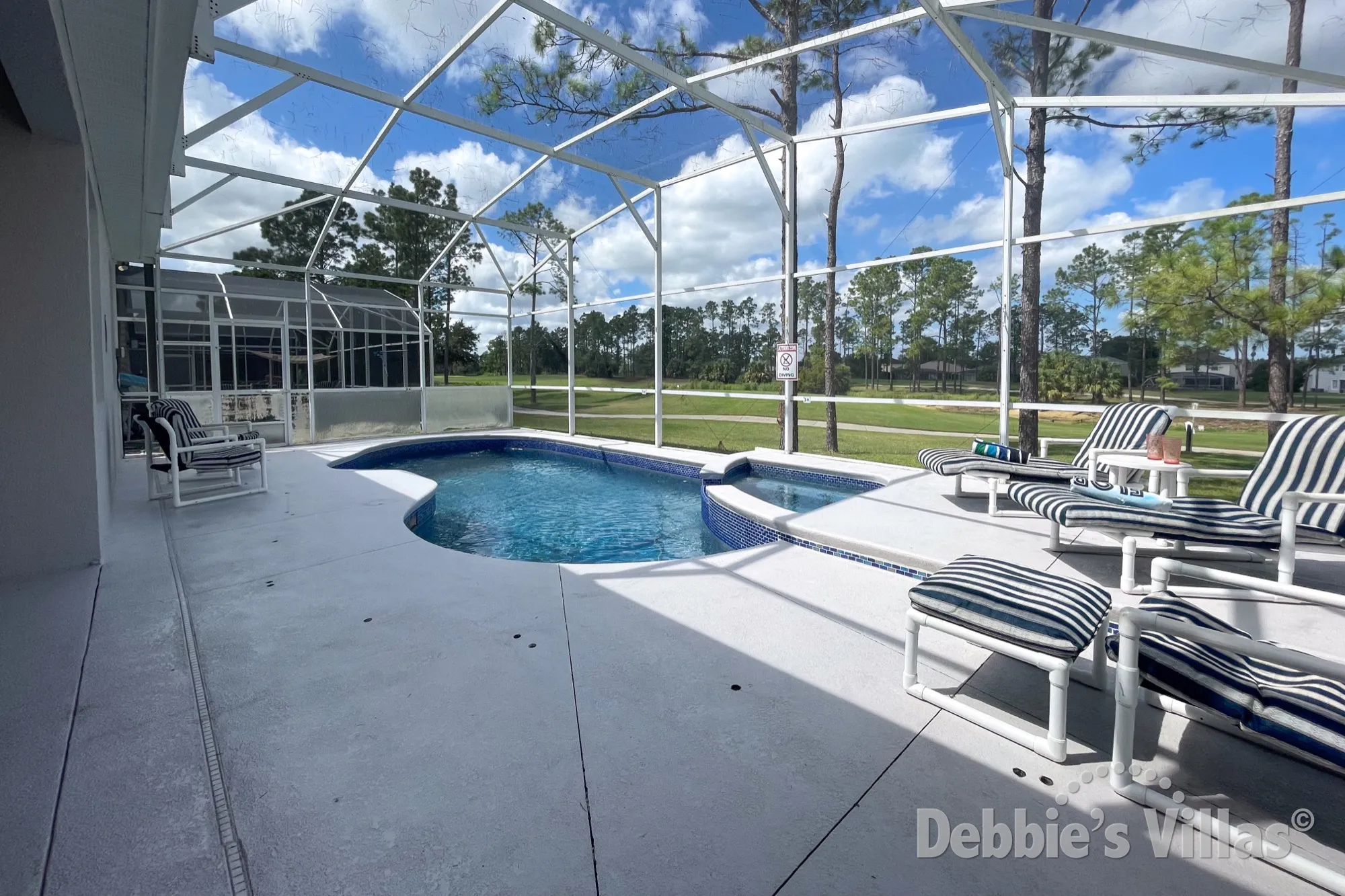 Golf course views from the west-facing pool deck at this Highlands Reserve vacation villa 